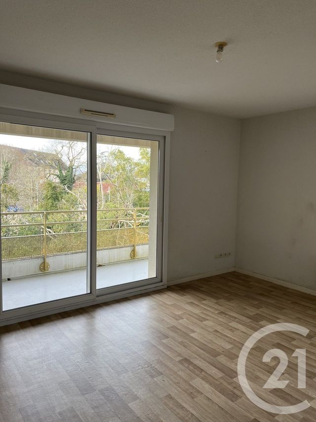 Appartement T3 à louer - 3 pièces - 59.72 m2 - ST SEURIN SUR L ISLE - 33 - AQUITAINE - Century 21 G&B Immobilier