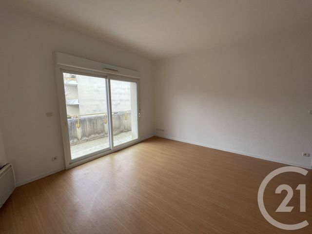 Appartement F3 à vendre - 3 pièces - 57.79 m2 - ST SEURIN SUR L ISLE - 33 - AQUITAINE - Century 21 G&B Immobilier